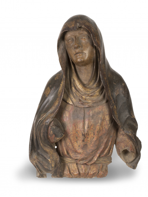 Virgen Dolorosa.Escultura en madera tallada con restos de