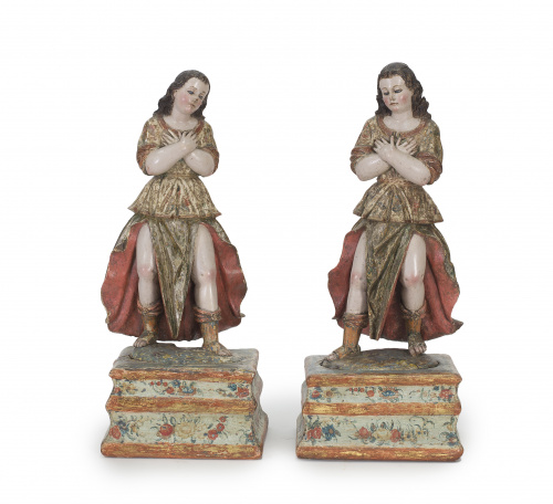 “Pareja de ángeles” En madera tallada, estucada, policromad