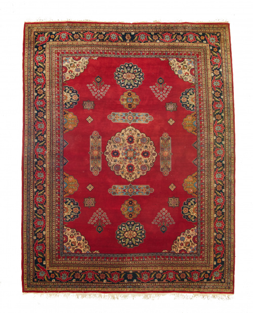 Alfombra Tekke en lana con campo rojo y motivos de flores e