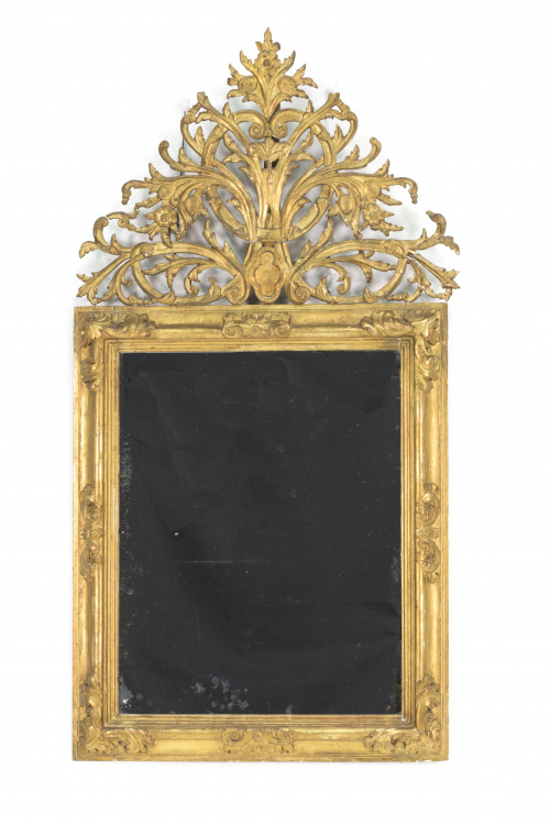 Espejo en madera tallada, calada y dorada.S. XIX