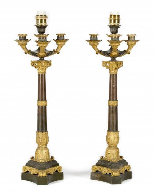 Pareja de candelabros Carlos X de cuatro brazos luz de bron