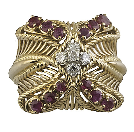 Sortija años 50 con aspa de rubíes y centro de rosetón de b