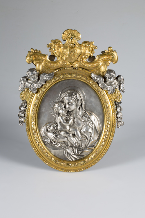 Virgen con el niño, plata cincelada. enmarcada en bronce do