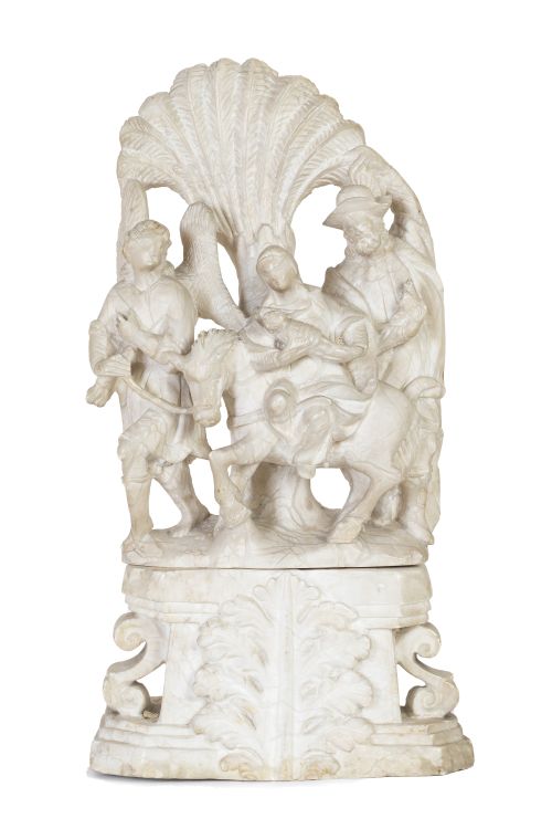 La huida a Egipto.Grupo escultórico en alabastro tallado.