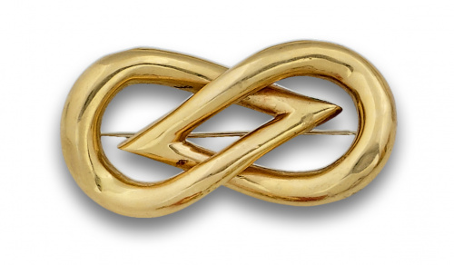 Broche nudo en oro de 18K.