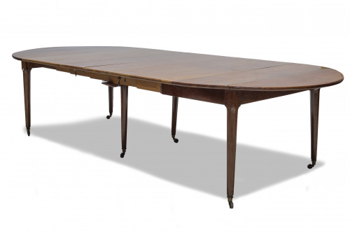 Mesa de comedor oval extensible de madera de cerezo.Trabaj