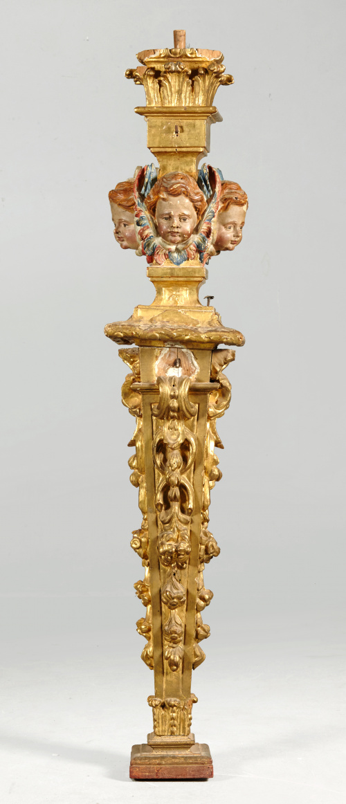 Columna es estípite de madera tallada, estucada, policromad