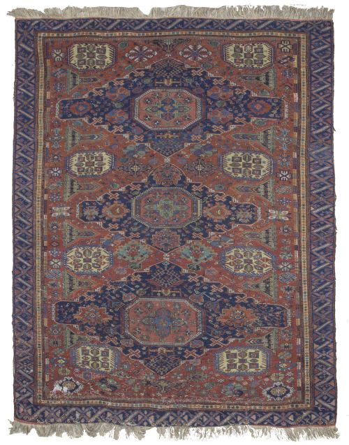 Alfombra Soumak antigua en lana, de campo rojo.Este caucá