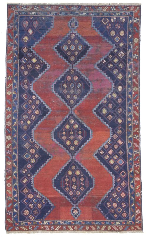 Alfombra en lana de campo rojo y azul y decoración geométri