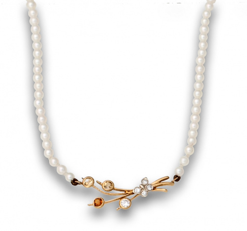 Gargantilla de perlas con oro amarillo,brillantes y topacio