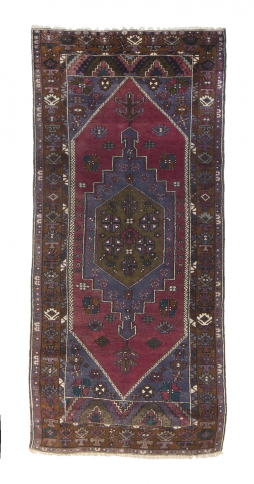 Alfombra Yagciberdir anudada a mano en lana en colores azul