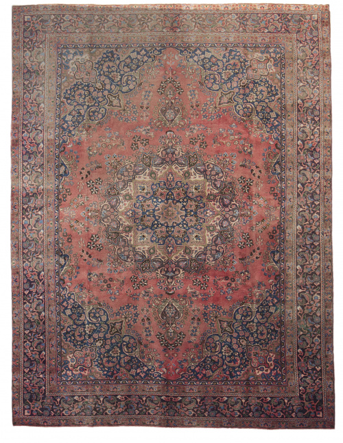 Alfombra persa en lana Meshad, con campo rojo y medallón ce