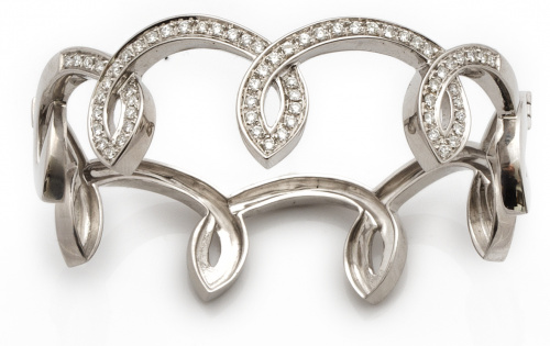 Brazalete rígido con ondas de brillantes a modo de corona, 