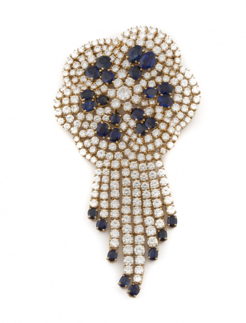 Importante broche flor con centro de zafiros de talla oval 