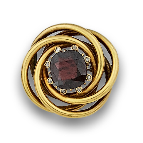 Broche de pps s XX con granate rodeado de brillantes de tal