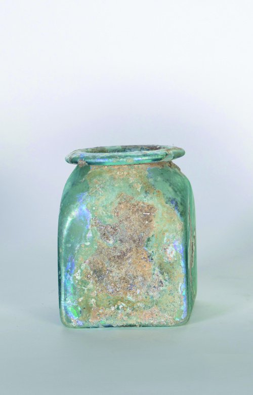 Tarro de vidrio romano con iridiscencias propios del vidrio