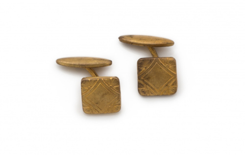Lote de dos pares de gemelos pp s.XX en metal dorado.