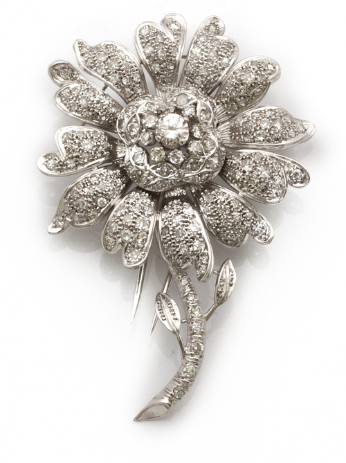 Elegante broche flor de platino y brillantes años 60