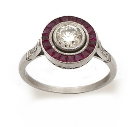 Sortija ojo de perdiz con un brillante central de 0,60 apro