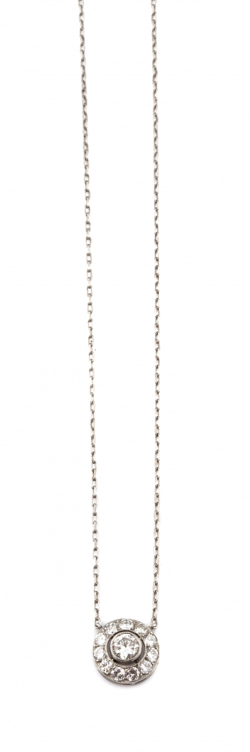 Colgante ojo de perdiz con brillante central orlado de bril