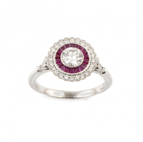 Sortija ojo de perdiz con brillante central de 0,50 ct orla