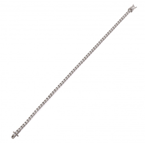 Pulsera rivière de brillantes en garras articuladas de oro 