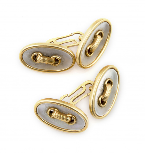 Gemelos dobles de pp. s.XX en forma de botones ovalados en 