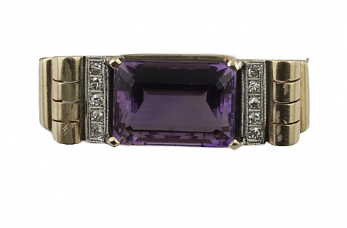 Broche años 30 con amatista rectangular entre bandas de bri
