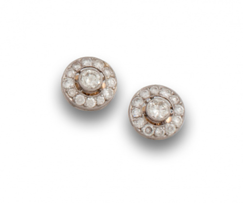 Pendientes ojo de perdiz con brillante central de 0,26 ctes