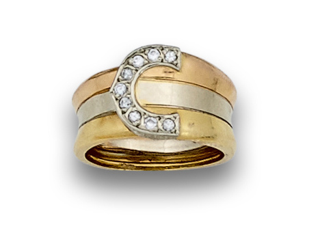 Anillo con hebilla de brillantes en montura de oro tricolor