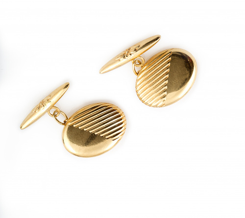 Gemelos ovalados con bandas rayadas y parte lisa para grabar