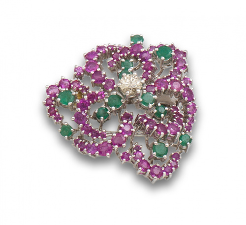 Broche flor años 60 de rubíes y esmeraldas, con centro de b