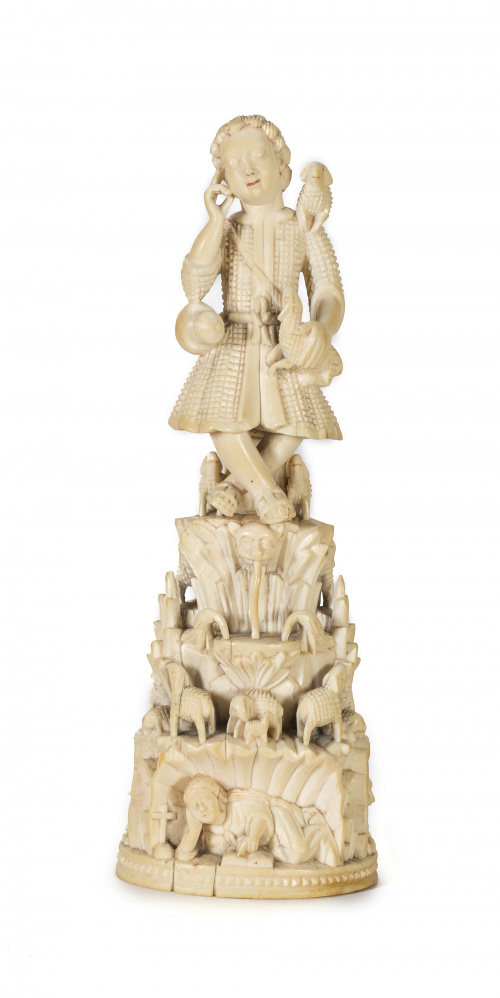 “Buen pastor” en marfil tallado y parcialmente policromado.