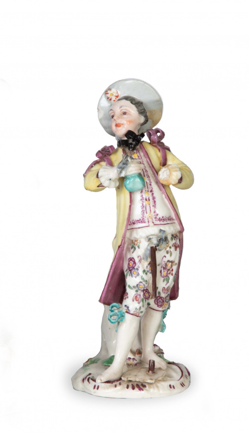 Joven con casaca.Figura de porcelana esmaltada.Meissen,