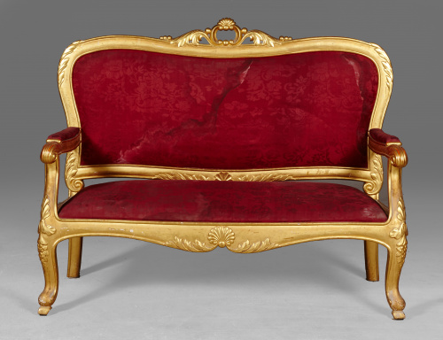 Sofá Carlos III de madera tallada y dorada.Trabajo español