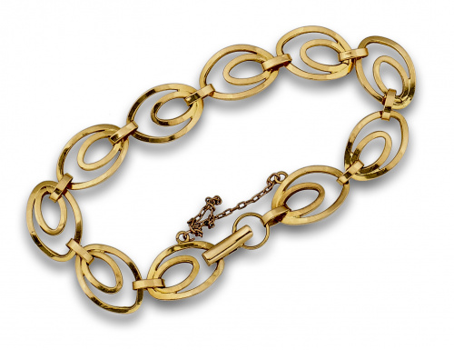Pulsera con dobles óvalos en oro de 18K.