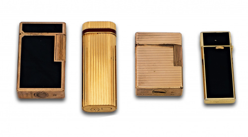 Lote de cuatro encendedores:Dos DUPONT ,un CARTIER ,un SHAR