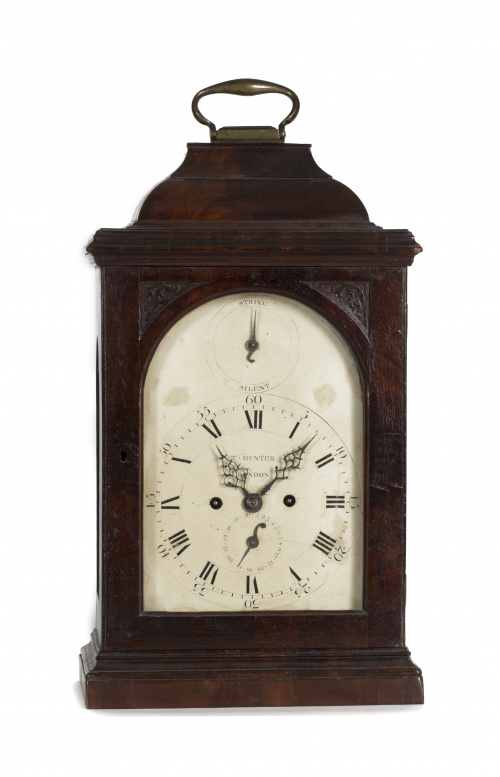 Reloj bracket Jorge III en madera de caoba, firmado en la e