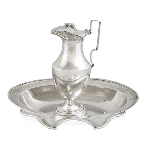 Jarro y jofaina de plata. Con marcas.En su soporte origin