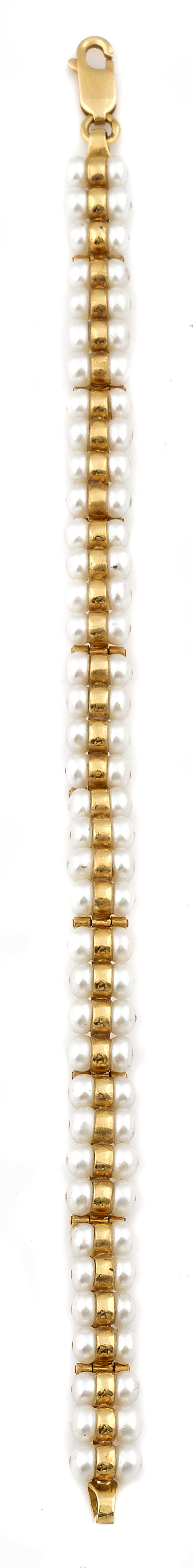 Pulsera con doble fila de perlas entre aros de oro