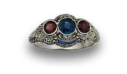 Anillo Art-Decó con zafiro entre dos rubíes redondos en mon