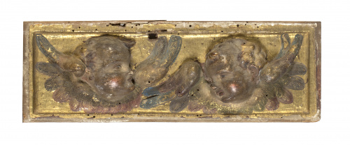 Pareja de relieves con cabezas de ángeles. Escuela castell