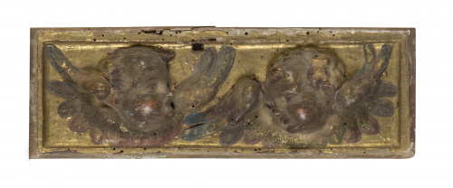 Pareja de relieves con cabezas de ángeles. Escuela castell