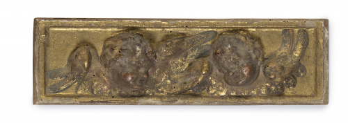 Pareja de relieves con cabezas de ángeles. Escuela castell