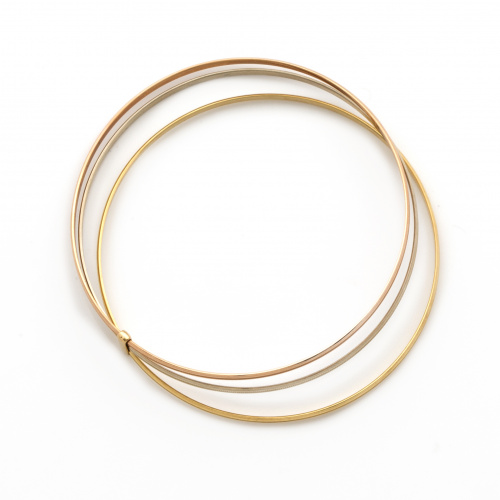 Pulsera formada por tres aros en oro tricolor de 18K con de