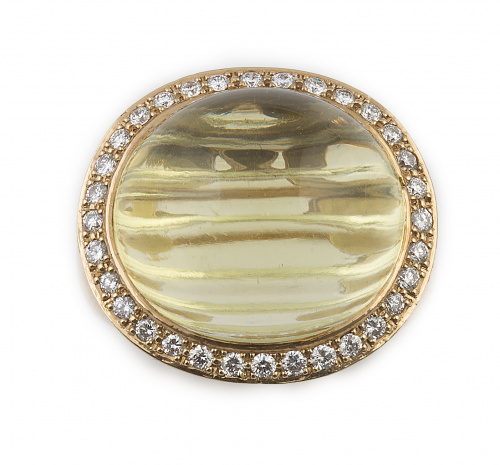 Sortija con un citrino lemon en cabuchón elevado orlado de 