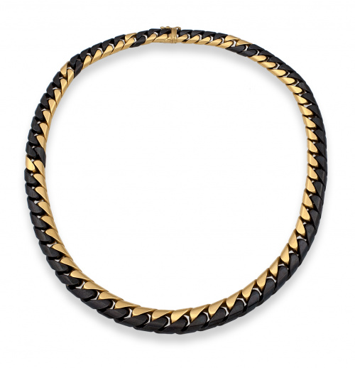 Collar en oro de 18 k,en su color y metal pavonado combinad