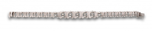 Pulsera articulada en oro blanco mateado de 18K con circoni