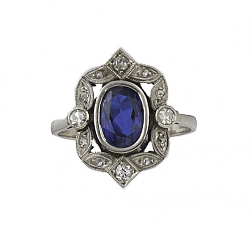 Sortija lanzadera de pp.S.XX con zafiro sintético central e