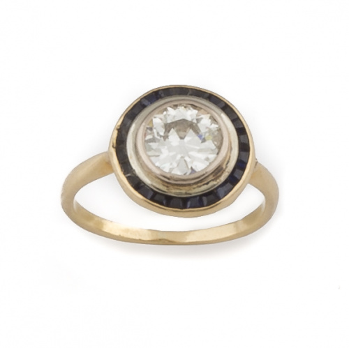 Sortija solitario ojo de perdiz con brillante central de 1,